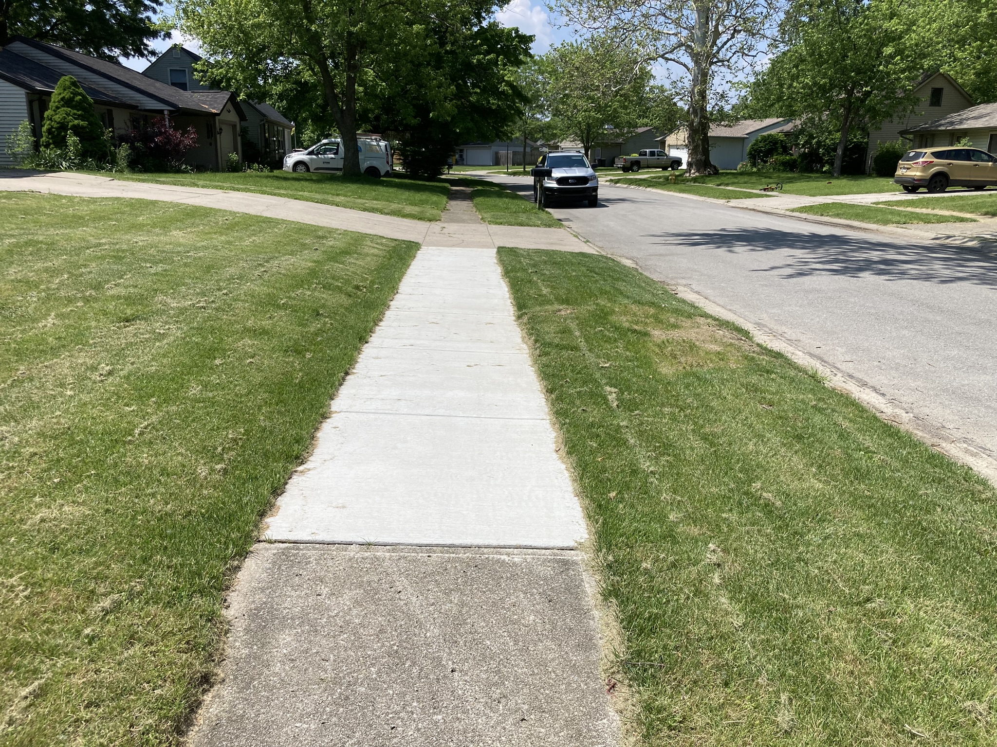 After: This new sidewalk has improved walkability for this street.