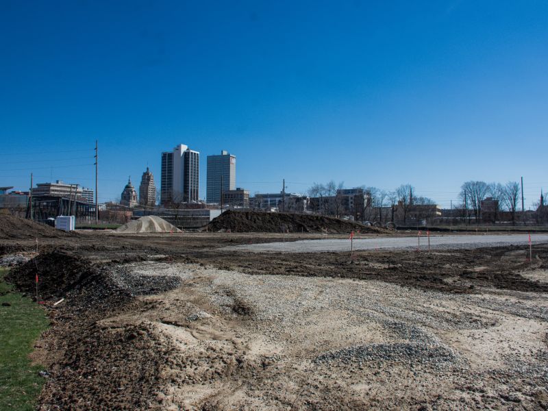 Construction site of the future mixed-use building, The Eddy. Downtown Fort Wayne skyline is in the background.
