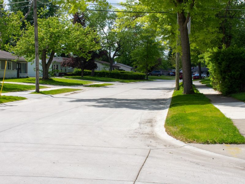 Image shows completed concrete street construction in Westchester neighborhood