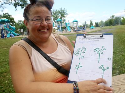 Residents contribute ideas to an upcoming art project in the Fairfield Terrace Belmont neighborhood