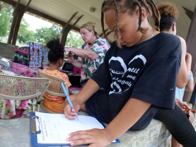 Residents contribute ideas to an upcoming art project in the Fairfield Terrace Belmont neighborhood