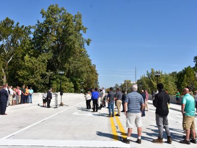Neighbors watch the Parnell Ave. Bridge ribbon cutting