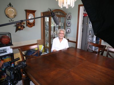 Harvester residents participate in the filming of a documentary about their neighborhood history