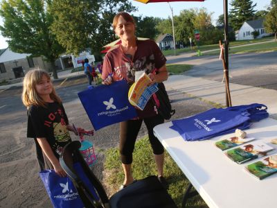 Harvester residents learn how to capture footage of the neighborhood for an upcoming documentary 